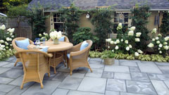 Outdoor seating and dining in small patio garden