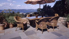Patio with Hudson River views by Westover Landscape Design